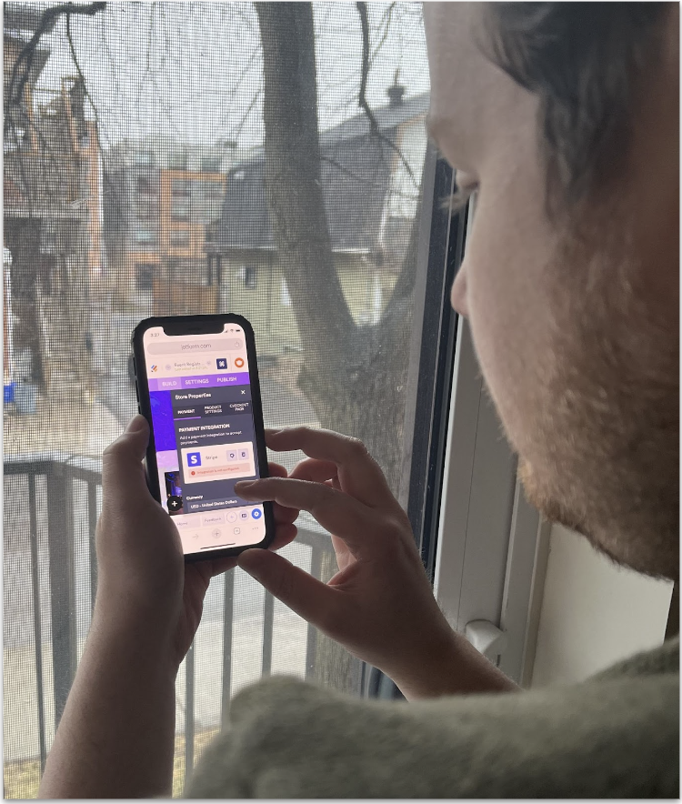 Person testing a form builder on mobile