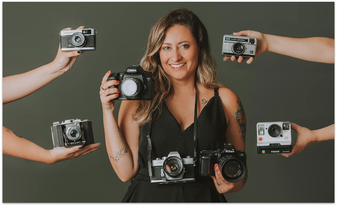 A photographer posing