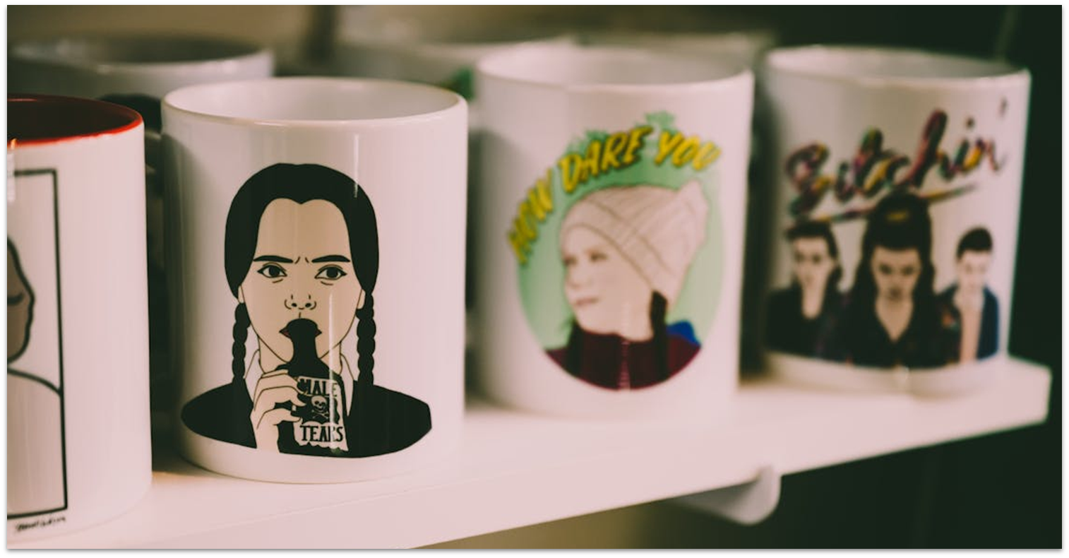 Custom design mugs on a shelf