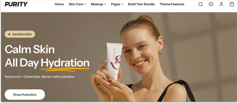 Shopify's skincare template, showing a model holding a skincare product and smiling.